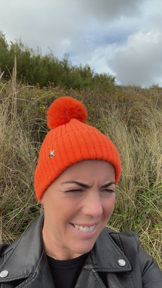 Orange star bobble hat